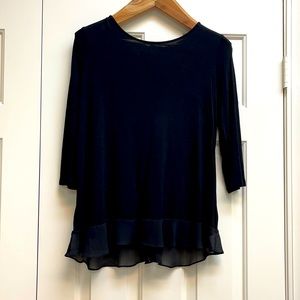 Black Ellen Tracy flowy top with frill him and back bow.